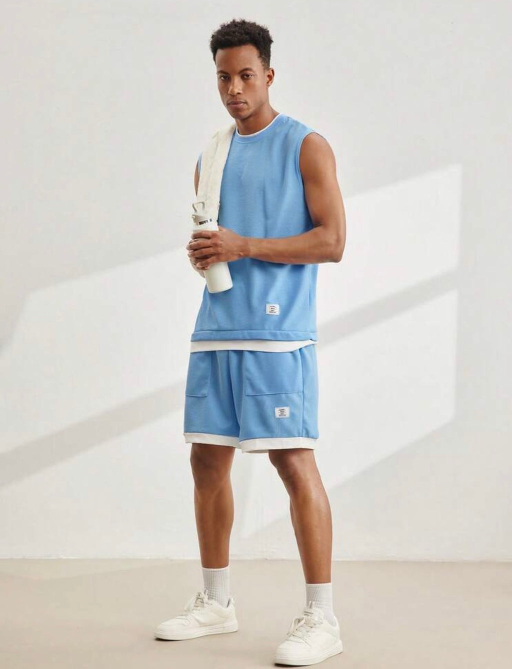 Casual men’s blue knitted tank top and shorts set, round neck, lightweight summer outfit, perfect for daily wear and Father’s Day gift.
